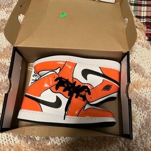 Jordan Youth Sneakers in Orange, Black, and White. Size 6.5Y